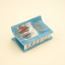 Pinza Libro